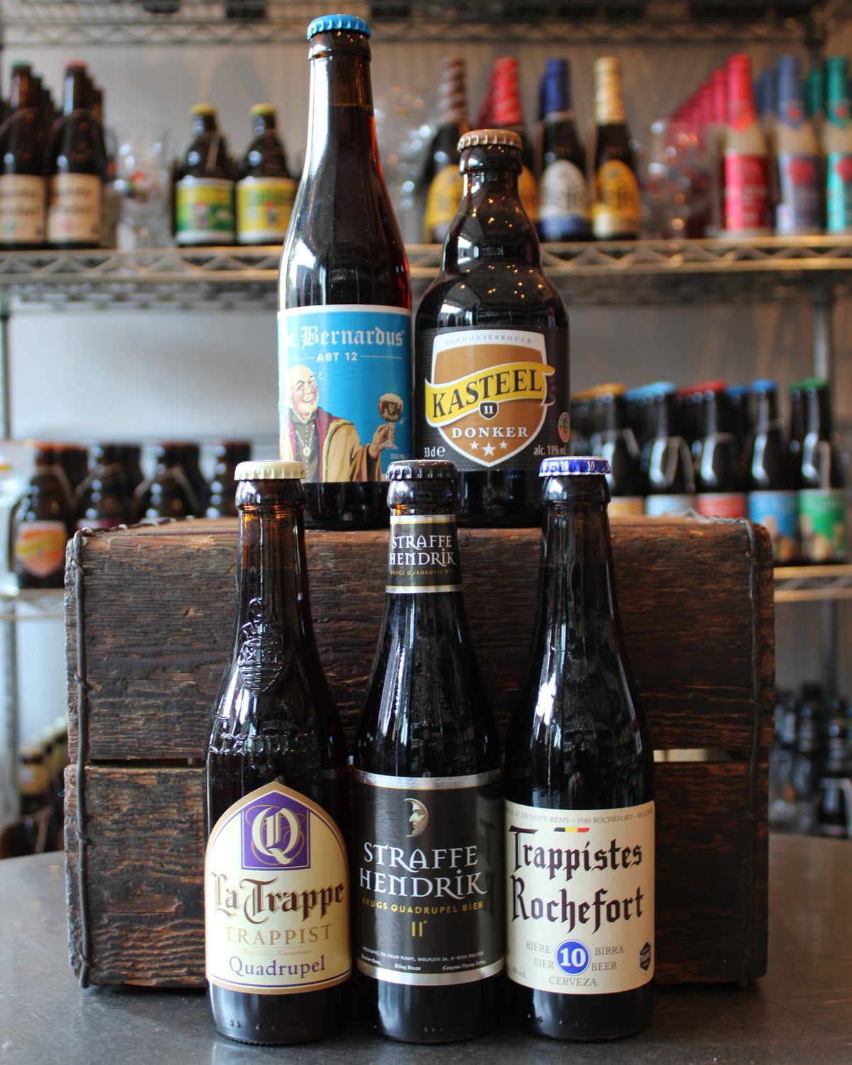 Display of Belgian quadrupel and strong dark ale bottles