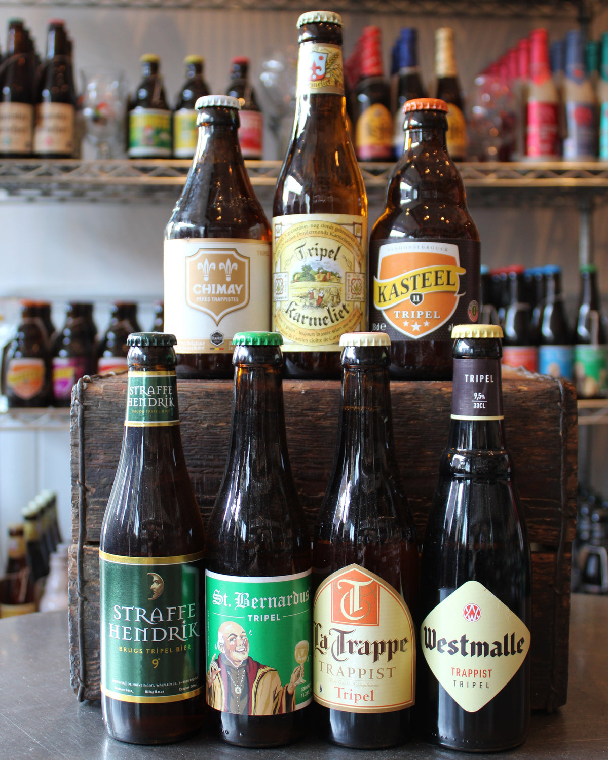 Display of Belgian tripel beer bottles