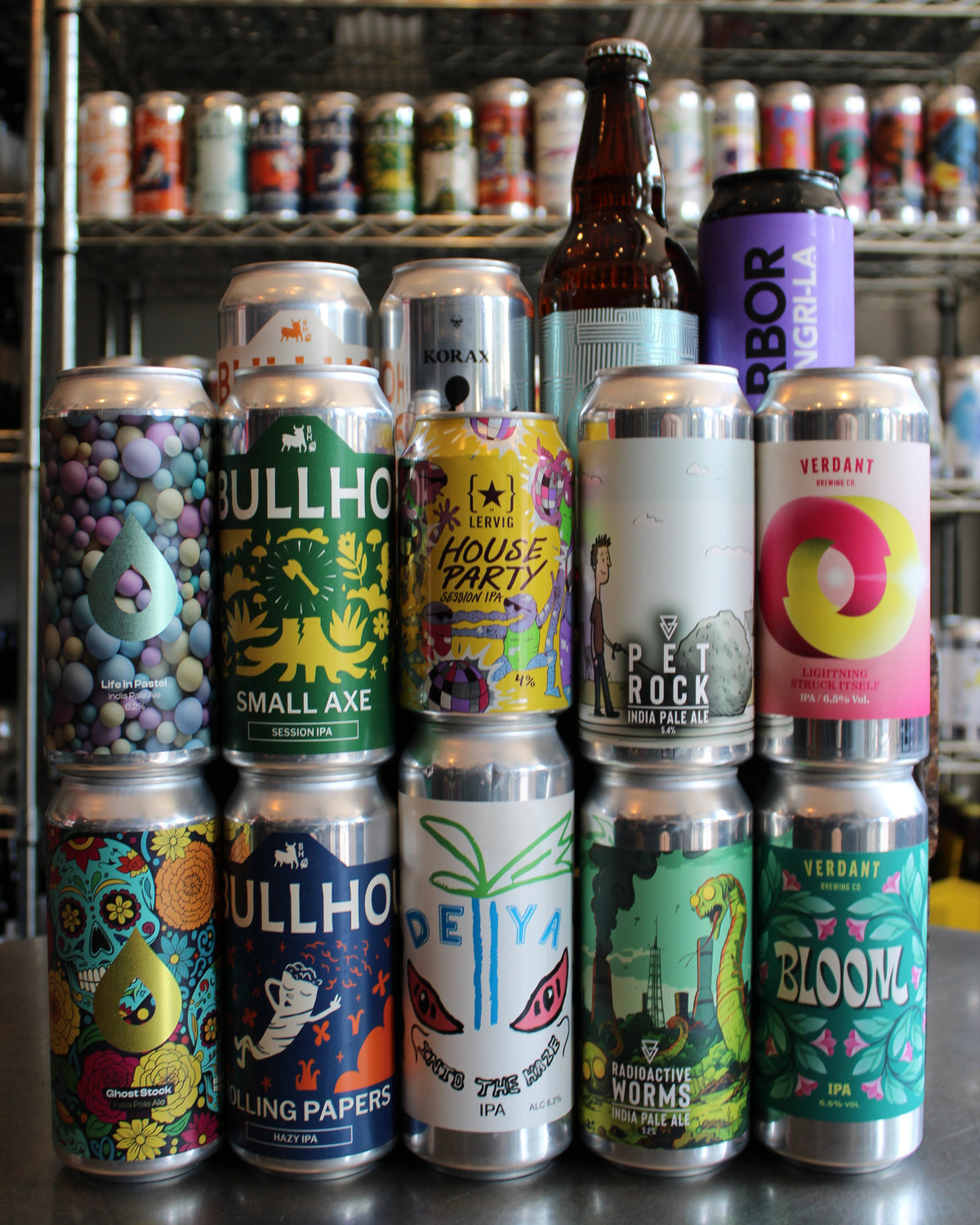 Display of IPA cans and bottles from independent craft breweries