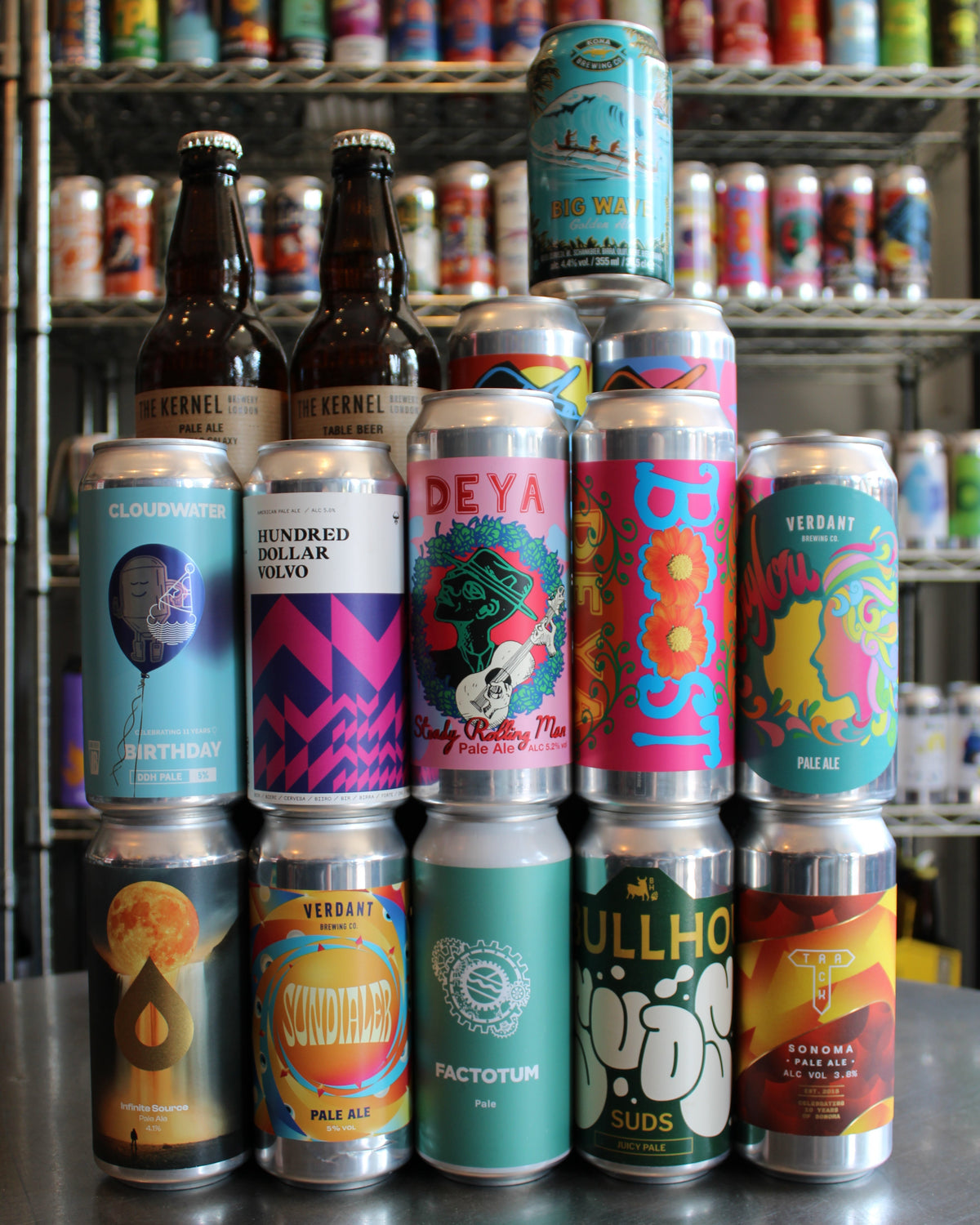 Display of pale ale cans and bottles from independent craft breweries