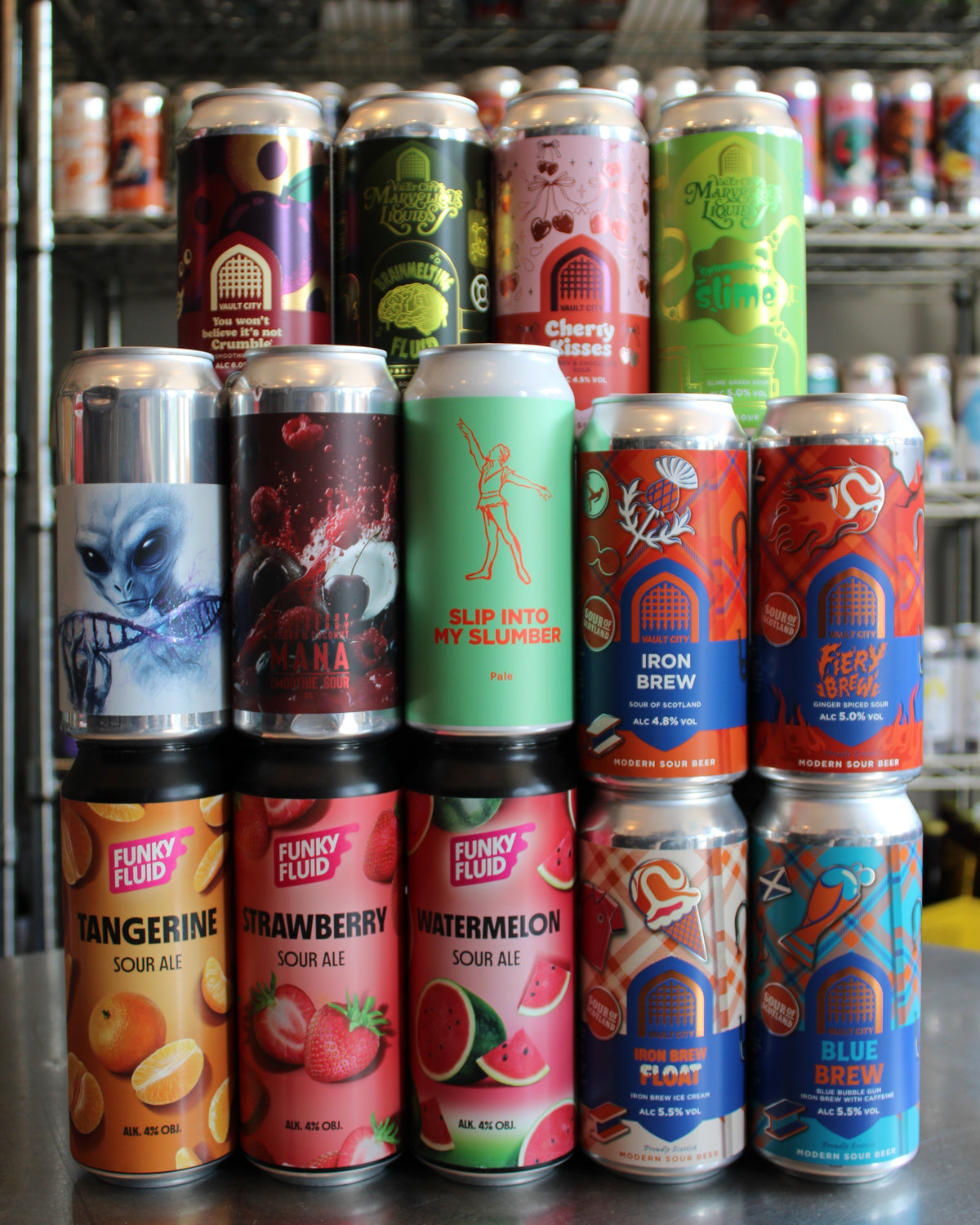 Display of fruit and sour beer cans and bottles